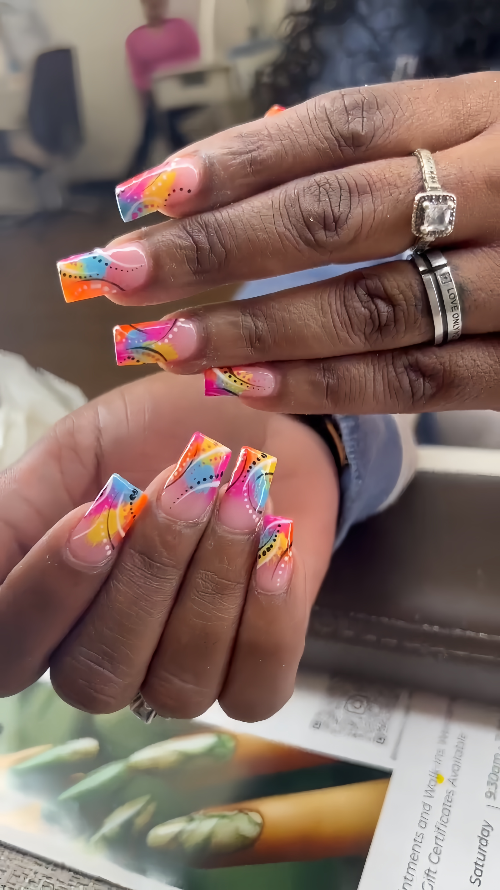 Rainbow neon tips with abstract swirl art